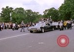 Image of Major Cooper in a open car Washington DC USA, 1963, second 14 stock footage video 65675025271