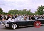 Image of Major Cooper in a open car Washington DC USA, 1963, second 20 stock footage video 65675025271