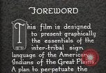 Standbild Native American Indian Council Meeting mit Zeichensprache Fort Browning Montana USA, 1930, aus Sekunde 33 historischem Filmmaterial Videoclip 65675025291