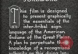 Standbild Native American Indian Council Meeting mit Zeichensprache Fort Browning Montana USA, 1930, aus Sekunde 39 historischem Filmmaterial Videoclip 65675025291