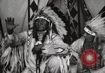 Image of Native American Indian Chief Deer Nose introduces himself Fort Browning Montana USA, 1930, second 15 stock footage video 65675025298