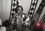 Image of Native American Indian Chief Bird Rattler of Blood Tribe Fort Browning Montana USA, 1930, second 13 stock footage video 65675025302
