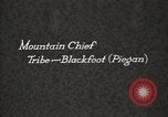 Image of Blackfoot Native American Indian Chief Mountain Chief Fort Browning Montana USA, 1930, second 5 stock footage video 65675025303