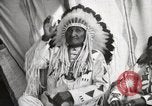 Image of Blackfoot Native American Indian Chief Mountain Chief Fort Browning Montana USA, 1930, second 8 stock footage video 65675025303