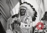 Image of Blackfoot Native American Indian Chief Mountain Chief Fort Browning Montana USA, 1930, second 10 stock footage video 65675025303