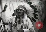 Image of Arapahoe Native American Indian Chief Tom White Horse Fort Browning Montana USA, 1930, second 10 stock footage video 65675025305