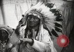 Image of Arapahoe Native American Indian Chief Tom White Horse Fort Browning Montana USA, 1930, second 15 stock footage video 65675025305