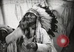 Image of Arapahoe Native American Indian Chief Tom White Horse Fort Browning Montana USA, 1930, second 17 stock footage video 65675025305
