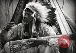 Image of Native American Indian Assinniboine Chief Rides Black Horse Fort Browning Montana USA, 1930, second 9 stock footage video 65675025306