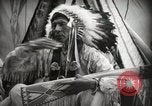 Image of Native American Indian Assinniboine Chief Rides Black Horse Fort Browning Montana USA, 1930, second 10 stock footage video 65675025306