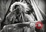 Image of Native American Indian Assinniboine Chief Rides Black Horse Fort Browning Montana USA, 1930, second 12 stock footage video 65675025306