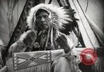 Image of Native American Indian Assinniboine Chief Rides Black Horse Fort Browning Montana USA, 1930, second 13 stock footage video 65675025306
