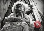 Image of Native American Indian Assinniboine Chief Rides Black Horse Fort Browning Montana USA, 1930, second 20 stock footage video 65675025306