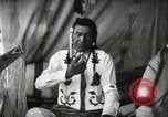 Image of Native American Indian Chief Little Plume of Piegan tribe Fort Browning Montana USA, 1930, second 8 stock footage video 65675025307