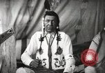 Image of Native American Indian Chief Little Plume of Piegan tribe Fort Browning Montana USA, 1930, second 10 stock footage video 65675025307
