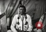 Image of Native American Indian Chief Little Plume of Piegan tribe Fort Browning Montana USA, 1930, second 14 stock footage video 65675025307