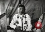 Image of Native American Indian Chief Little Plume of Piegan tribe Fort Browning Montana USA, 1930, second 15 stock footage video 65675025307