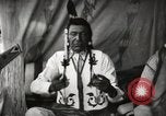 Image of Native American Indian Chief Little Plume of Piegan tribe Fort Browning Montana USA, 1930, second 16 stock footage video 65675025307