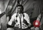 Image of Native American Indian Chief Little Plume of Piegan tribe Fort Browning Montana USA, 1930, second 17 stock footage video 65675025307