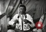 Image of Native American Indian Chief Little Plume of Piegan tribe Fort Browning Montana USA, 1930, second 18 stock footage video 65675025307