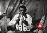 Image of Native American Indian Chief Little Plume of Piegan tribe Fort Browning Montana USA, 1930, second 20 stock footage video 65675025307