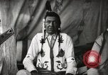 Image of Native American Indian Chief Little Plume of Piegan tribe Fort Browning Montana USA, 1930, second 21 stock footage video 65675025307
