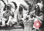 Image of Piegan Native American Indian Mountain Chief narrates a story Fort Browning Montana USA, 1930, second 23 stock footage video 65675025310