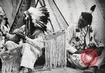 Image of Piegan Native American Indian Mountain Chief narrates a story Fort Browning Montana USA, 1930, second 29 stock footage video 65675025310