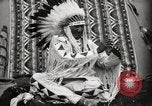 Image of Piegan Native American Indian Mountain Chief narrates a story Fort Browning Montana USA, 1930, second 58 stock footage video 65675025310