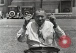 Image of Native American Indian man narrates story in sign Montana United States USA, 1934, second 27 stock footage video 65675025312