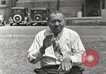 Image of Native American Indian man narrates story in sign Montana United States USA, 1934, second 28 stock footage video 65675025312