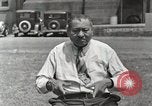 Image of Native American Indian man narrates story in sign Montana United States USA, 1934, second 31 stock footage video 65675025312