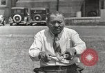 Image of Native American Indian man narrates story in sign Montana United States USA, 1934, second 33 stock footage video 65675025312