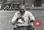 Image of Native American Indian man narrates story in sign Montana United States USA, 1934, second 45 stock footage video 65675025312