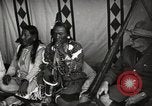 Image of Native American Indian Tribal Council members tell jokes Fort Browning Montana USA, 1930, second 15 stock footage video 65675025317