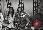 Image of Native American Indian Tribal Council members tell jokes Fort Browning Montana USA, 1930, second 16 stock footage video 65675025317