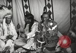 Image of Native American Indian Tribal Council members tell jokes Fort Browning Montana USA, 1930, second 18 stock footage video 65675025317