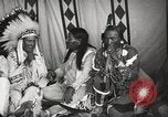 Image of Native American Indian Tribal Council members tell jokes Fort Browning Montana USA, 1930, second 19 stock footage video 65675025317