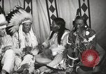 Image of Native American Indian Tribal Council members tell jokes Fort Browning Montana USA, 1930, second 20 stock footage video 65675025317