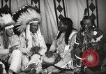 Image of Native American Indian Tribal Council members tell jokes Fort Browning Montana USA, 1930, second 21 stock footage video 65675025317