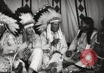 Image of Native American Indian Tribal Council members tell jokes Fort Browning Montana USA, 1930, second 24 stock footage video 65675025317