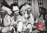 Image of Native American Indian Tribal Council members tell jokes Fort Browning Montana USA, 1930, second 25 stock footage video 65675025317