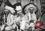 Image of Native American Indian Tribal Council members tell jokes Fort Browning Montana USA, 1930, second 26 stock footage video 65675025317