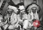 Image of Native American Indian Tribal Council members tell jokes Fort Browning Montana USA, 1930, second 27 stock footage video 65675025317