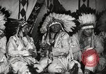 Image of Native American Indian Tribal Council members tell jokes Fort Browning Montana USA, 1930, second 30 stock footage video 65675025317