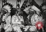 Image of Native American Indian Tribal Council members tell jokes Fort Browning Montana USA, 1930, second 32 stock footage video 65675025317