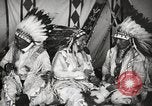 Image of Native American Indian Tribal Council members tell jokes Fort Browning Montana USA, 1930, second 33 stock footage video 65675025317