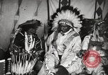 Image of Native American Indian Tribal Council members tell jokes Fort Browning Montana USA, 1930, second 37 stock footage video 65675025317