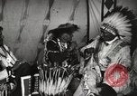 Image of Native American Indian Tribal Council members tell jokes Fort Browning Montana USA, 1930, second 39 stock footage video 65675025317