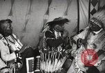 Image of Native American Indian Tribal Council members tell jokes Fort Browning Montana USA, 1930, second 40 stock footage video 65675025317